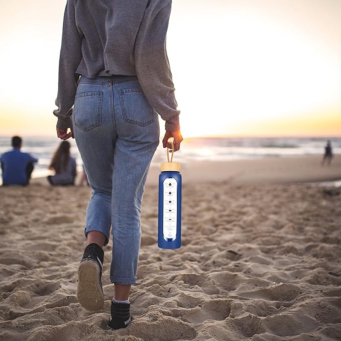 32 Oz Borosilicate Glass Water Bottle with Times to Drink | BPA Free - Reusable Wide Mouth Glass Motivational Water Bottles with Infuser & Silicone Sleeve (dark blue)